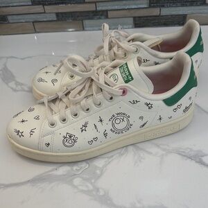 Adidas Cream Sneakers with Black Graphics and Green Detail